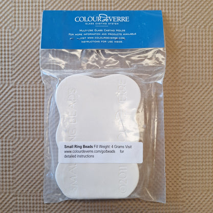 Packaged glass casting mold with 'Colour de Verre' branding on a textured brown background