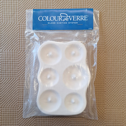 Packaged glass casting mold with 'Colour de Verre' branding on a textured brown background